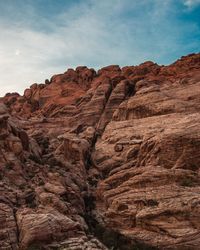 Scenic view of rock formation against sky