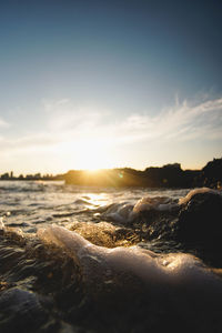 Scenic view of sea against sky during sunset