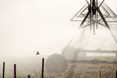 Fog in water against sky during foggy weather