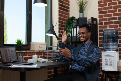 Businessman doing video call at office