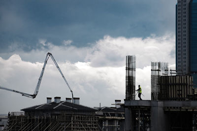 Modern buildings in city against sky