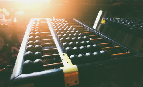 Close-up of piano keys on table