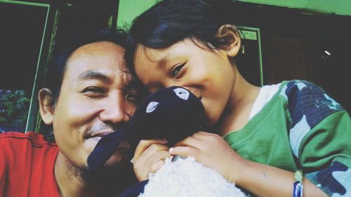 Portrait of couple kissing