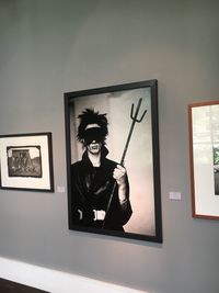 Portrait of young man standing in museum