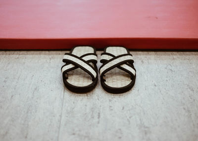 Close-up of shoes on table