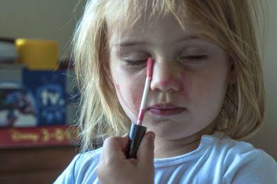 Close-up of girl at home