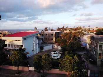 High angle view of buildings and street against sky