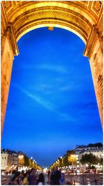 Low angle view of building against blue sky