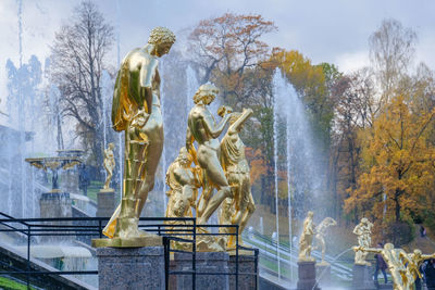 Panoramic view of statue against trees