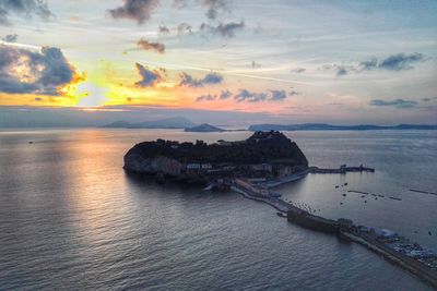 Scenic view of sea against sky at sunset