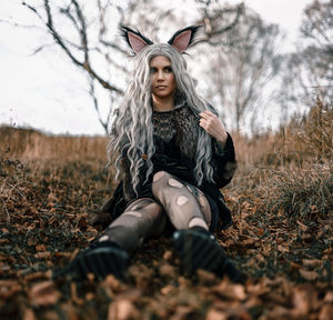 Young woman wearing mask on field