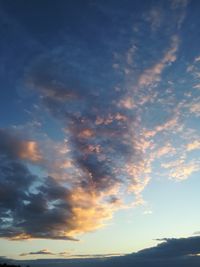 Low angle view of dramatic sky during sunset