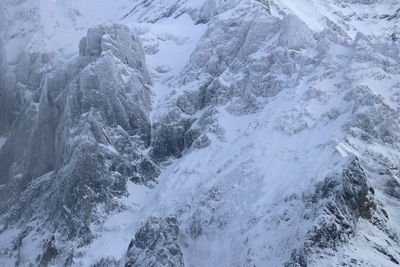 Scenic view of snowcapped mountains during winter