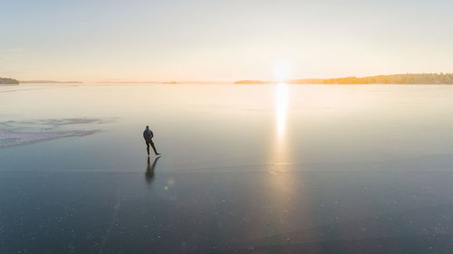 Ice skater on frozen sea