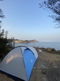 Scenic view of sea against clear blue sky