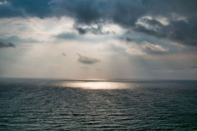 Scenic view of seascape against sky during sunset