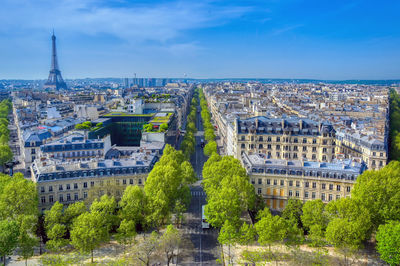 Panoramic view of buildings in city against sky