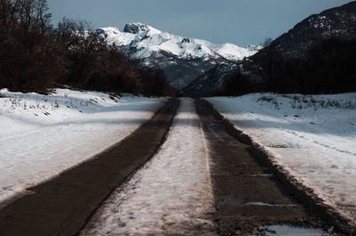 Scenic view of snow covered mountains