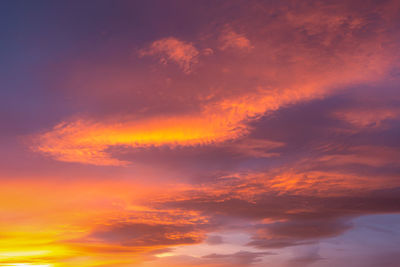 Low angle view of dramatic sky during sunset