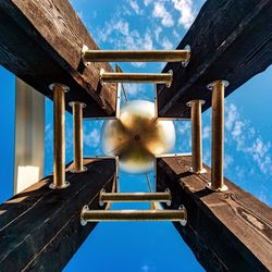 Low angle view of pier against sky