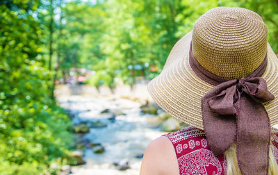 Rear view of woman wearing hat