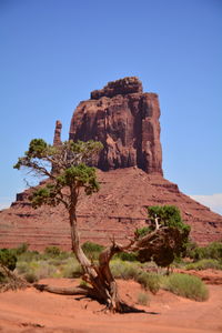 Rock formation at monument valley against clear sky