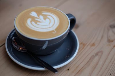 High angle view of cappuccino on table