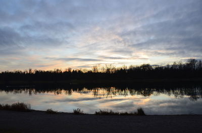 Reflection of clouds in lake during sunset