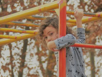 Portrait of boy playing in playground