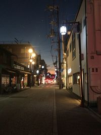 Illuminated street at night