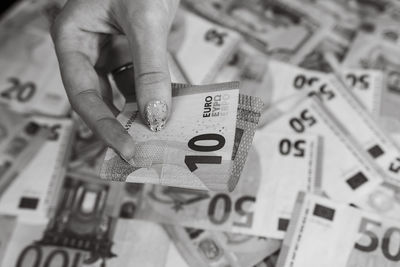 Cropped hands of man holding bitcoin