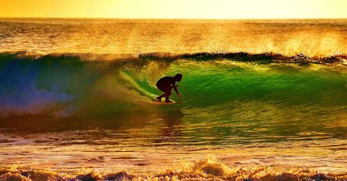 Tourists enjoying at sunset