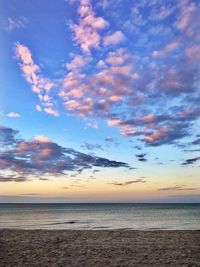 Scenic view of sea against sky at sunset