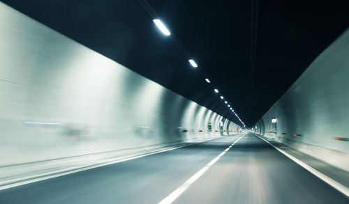 Blurred motion of illuminated empty tunnel