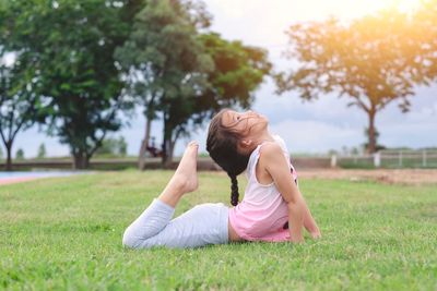 Woman sitting on field