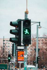 View of road sign against sky