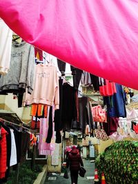 Clothes drying on market stall