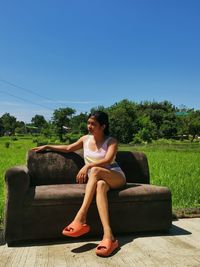 Sitting next to rice fields in a sunny afternoon