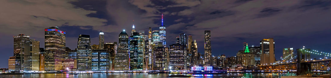 Illuminated buildings in city at night