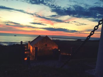 Scenic view of sea at sunset