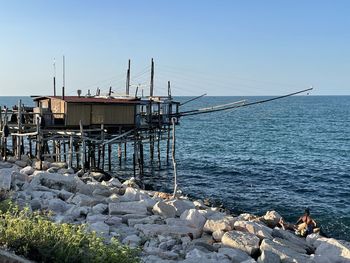 Scenic view of sea against clear blue sky