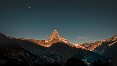 Scenic view of mountains against clear sky
