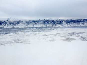 Scenic view of snow covered mountains