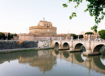Ponte sant angelo bridge over tiber river against hadrian tomb