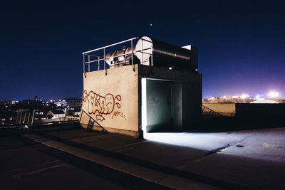 Built structure against sky at night