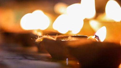Close-up of lit candle
