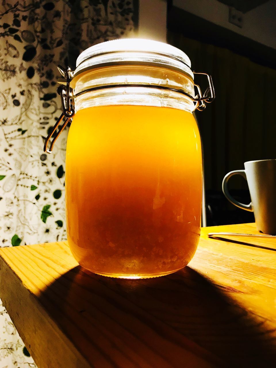 CLOSE-UP OF DRINK IN JAR