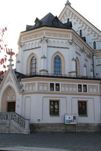 Exterior of houses in town against clear sky