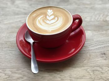 Close-up of cappuccino on table