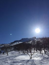 Scenic view of snowcapped mountain against sky